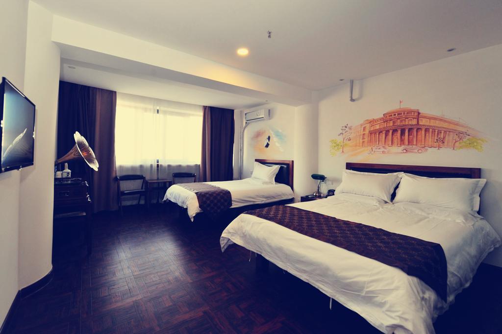 Nostalgiahotel-Tianjinguozhancenter Zimmer foto