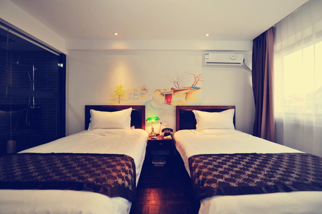 Nostalgiahotel-Tianjinguozhancenter Zimmer foto