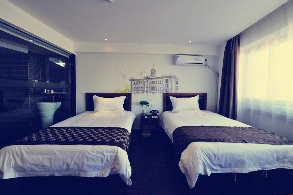 Nostalgiahotel-Tianjinguozhancenter Zimmer foto